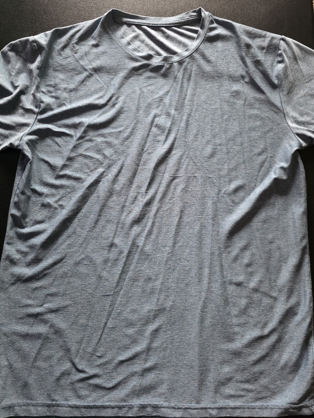 Gently Used Mens size Large Spyder Athletic shirt in light blue